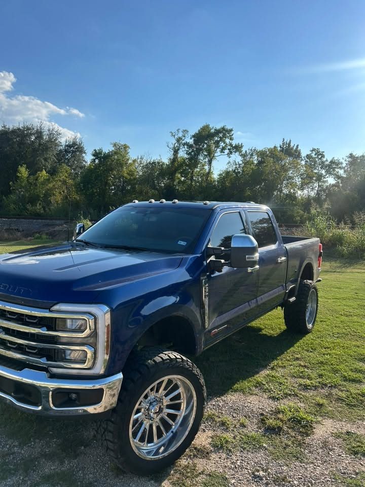 A lifted truck with freshly tinted windows, tinted by Chavez Tint