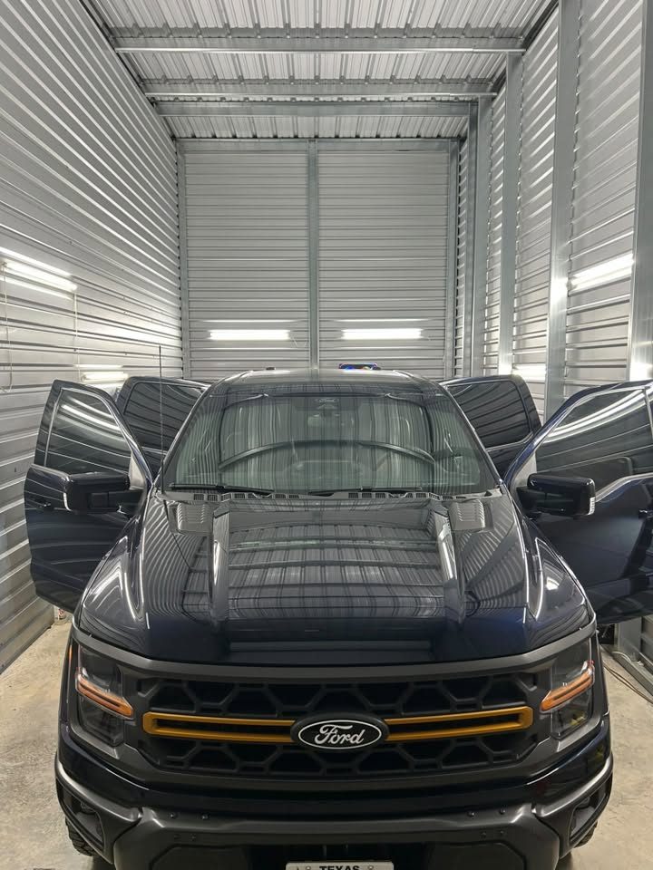 A Ford truck inside the Chavez Tint shop